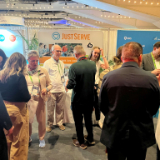 /media/orig/2-A-JustServe-at-trade-show.jpg