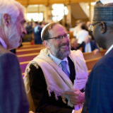 Des dirigeants religieux arrivent au forum interreligieux du G20 de 2026 dans le Tabernacle de Salt Lake City, le jeudi 15 octobre 2026.