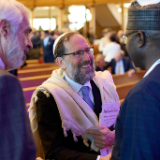 Des dirigeants religieux arrivent au forum interreligieux du G20 de 2026 dans le Tabernacle de Salt Lake City, le jeudi 15 octobre 2026.